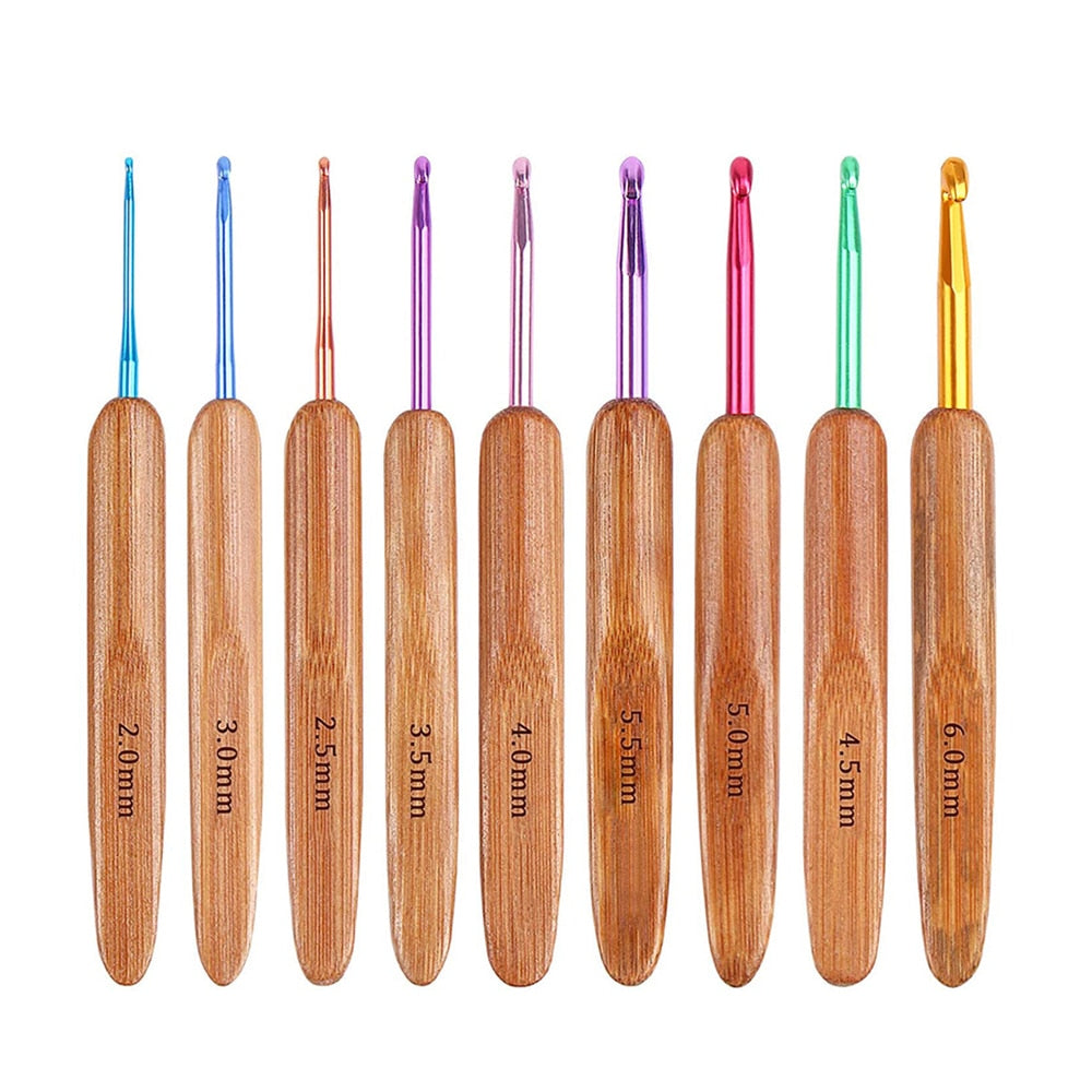 9pcs/Set 2mm-6mm Bamboo Knitting Needles Set Multicolor Knitting Hooks Set DIY Crochet Hooks Needles For Yarn Handle - TIKIJTRONICS 0 SPECIFICATIONSUse: KnittingType of Wholesale: noType: Knitting NeedleStyle: Sewing Needles ToolSize: 2-6mmSet Type: YESPacking: 9pcs/setOrigin: Mainland ChinaMaterial: Wood+metalLength: 14cmItem name: Crochet Hooks SetFeature: Knitting NeedlesBrand Name: FLRHSJX TIKIJTRONICS  (Store description)