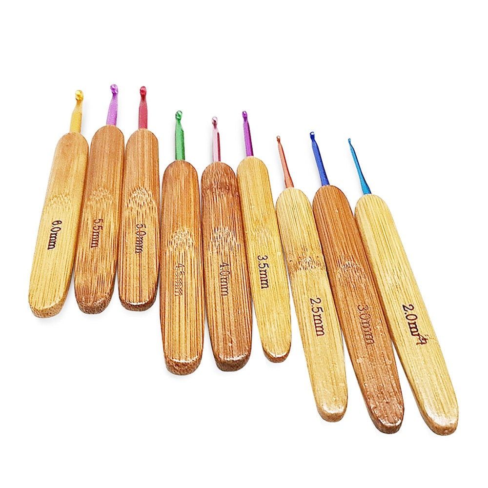 9pcs/Set 2mm-6mm Bamboo Knitting Needles Set Multicolor Knitting Hooks Set DIY Crochet Hooks Needles For Yarn Handle - TIKIJTRONICS 0 SPECIFICATIONSUse: KnittingType of Wholesale: noType: Knitting NeedleStyle: Sewing Needles ToolSize: 2-6mmSet Type: YESPacking: 9pcs/setOrigin: Mainland ChinaMaterial: Wood+metalLength: 14cmItem name: Crochet Hooks SetFeature: Knitting NeedlesBrand Name: FLRHSJX TIKIJTRONICS  (Store description)