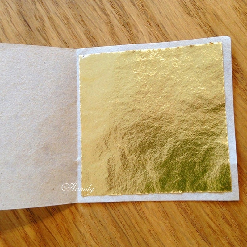 Aomily 9x9cm 100 Sheets Practical K Pure Shiny Gold Leaf for Gilding Funiture Lines Wall Crafts Handicrafts Gilding Decoration - TIKIJTRONICS 0 SPECIFICATIONSType of Wholesale: Yes(>50 Pcs)Set Type: YESOrigin: Mainland ChinaOccasion: Gift,Wedding,Party,Christmas,Anniversary,Halloween,Birthday,OfficeModel Number: Gold foilMaterial: Metal TIKIJTRONICS  (Store description)